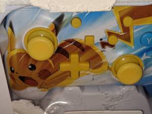lot 55 image: Nintendo Switch Pikachu Enhanced Wired Controller