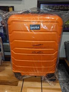 lot 275 image: In USA Orange Hard Side Carry On Suitcase