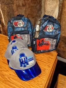 lot 168 image: Star Wars Galaxys Edge Trading Outpost Packpacks & Hats