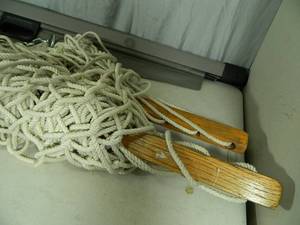 lot 128 image: Large Rope Hammock with Wood Bars and Car Trunk Cover.