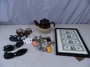 lot 53 image: Uncut Dollar Bills, Keys, Lock, Teapot, and More