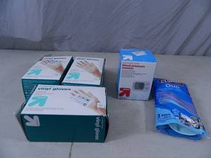 lot 111 image: New Gloves and Blood Pressure Monitor