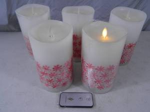 lot 129 image: 4 Luminara Flameless Candles with Remote
