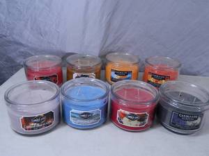 lot 133 image: 8 New 3 wick CandleLite Candles
