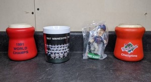 lot 157 image: Two Minnesota Twins World Series Koozies & 1987 Cup with Corey Koskie Figurine