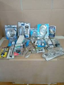 lot 15 image: Lot sorted with shower heads and faucets for bathrooms