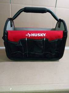 lot 17 image: 15 in open tool tote with rotating handle by husky- not used