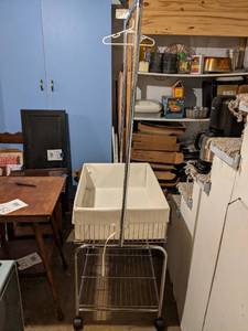 lot 257 image: Rolling Laundry Basket with Attached Bar for Hanging Clothes