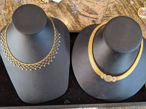 lot 105 image: Necklaces by Givenchy on left and Christian Dior on Right
