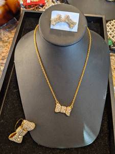 lot 111 image: Kate Spade Crystal Bow Necklace, Earrings and Ring Set
