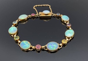 lot 32 image: Large, Beautiful Opal and Semi-Precious Gem Estate Bracelet in 14k Yellow Gold $2000