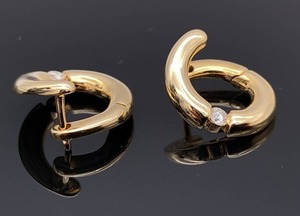 lot 56 image: Ladies Upscale Diamond Huggie Earrings in 14k Yellow Gold $1399