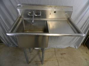 lot 15 image: 39 inch Stainless Steel Sink with Drain Board
