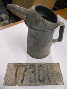 lot 30 image: Oil Can Pitcher and 1912-1914 License Plate (see pics for condition)