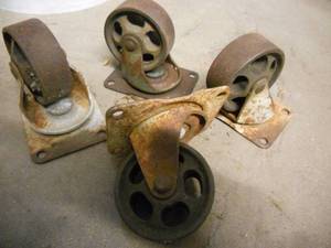 lot 42 image: 4 Heavy Antique Casters