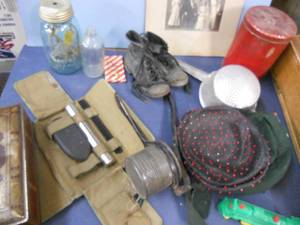 lot 84 image: Antique Tins, Shoes, Hats, Blue Canning Jar Light, Photo, Military Set, Ricer, Strainer, Train
