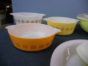 lot 18 image: Pyrex - Light Green Lasagne, Light Green Large Bowl with Lid, Lidght Green Small bowl, Pink Flamingo Pie Plate, Set of 3 Town and Country Orange, Yellow and White SET