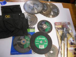lot 23 image: Construction Cut Off Saw Blades and Skil Saw Guide Tool and Carpenter Bag