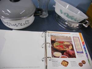 lot 37 image: Glassbake fruit bowl with holder, Cinsa Enamel Pot, Creative Cooks Subscription Cookbook - full, Coca Cola glass