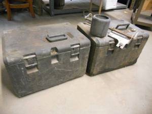 lot 134 image: 2 Chain Saw Boxes Plus Parts Chainsaw