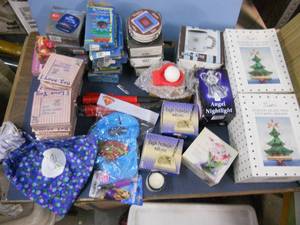 lot 114 image: 2 Stained Glass Stocking Holders, Angel Nightlight, Totally Cute Mitten Holder and Snowball Candle, and Much More