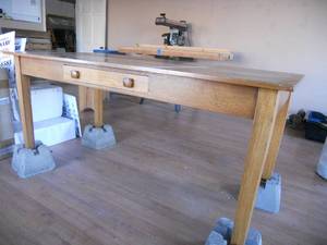 lot 160 image: Solid Oak Table 72x36x36 (Just sitting on the concrete blocks - not included)