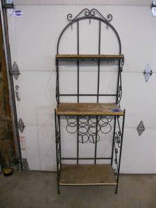 lot 33 image: Wine Rack with wine bottle holders and stemware slide and hooks on top. Needs some TLC. 70x25x12-12