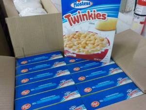 lot 203 image: Case of 12 - 12 oz Hostess Twinkies...