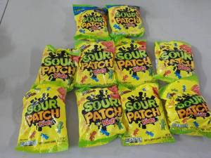 lot 228 image: Sour Patch Kids 8 oz- 10 bags near...