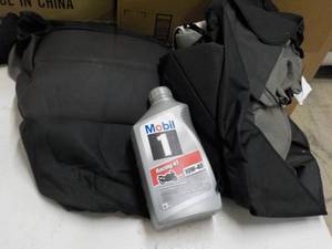 lot 89 image: Mobil Oil and Car Seats...