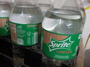 lot 116 image: 8 -2 Liter Bottles Sprite Ginger p...
