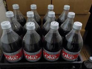 lot 166 image: Case of 12 - 1.25 Bottles Diet Coke...