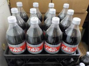 lot 168 image: Case of 12 - 1.25 Bottles Diet Coke...