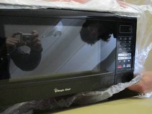 Magic Chef Microwave new in box...