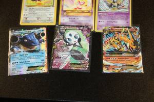 lot 50 image: Mixed Years Pokemon Card Lot  Charizard 2006-2014