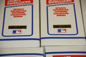 lot 105 image: Sports Impressions Figurine Resale Lot  (12) Mark McGwire