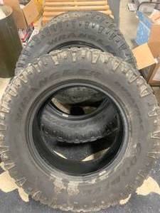 lot 29 image: Set of 4 Goodyear Wrangler Duratrac LT27570R18 Tires