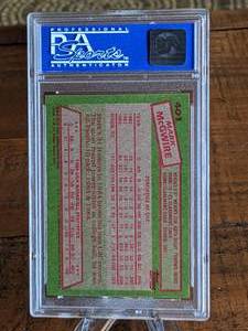 lot 30 image: 1985 Topps Mark McGwire Rookie Baseball Card - PSA NMMT 8