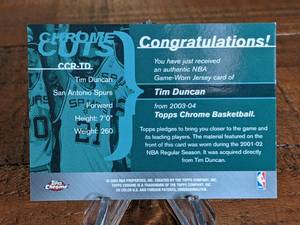 lot 64 image: 2004 Topps Chrome Tim Duncun Game-Worn Jersey Basketball Card