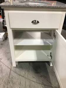 lot 37 image: Home Decorators Ridgemore 28 in. W x 22 in. D Vanity in White with Granite Vanity Top in Grey with White Sink see pictures