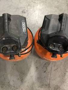 lot 113 image: Lot of 2 Ridgid Pancake comporessors used see pictures