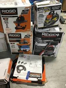 lot 114 image: Pallet with Ridgid Shop Vacs Tools  and accessories open Box see pictures