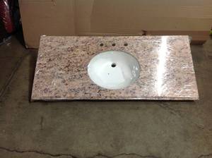 lot 10 image: St Paul 49 in. Stone Effects Vanity Top in Santa Cecilia with White Sink see pictures