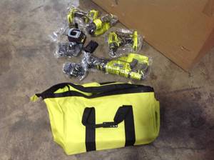 lot 40 image: Ryobi 18-Volt ONE Lithium-ion Brushless Cordless 4-Tool Combo Kit with (2) 2.0 Ah Batteries, Charger, and Bag see pictures