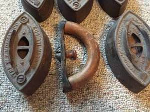 lot 73 image: Five Vintage Irons & One Handle