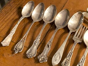 lot 128 image: Sterling Spoons and Two Napkin Rings