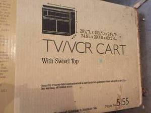 lot 324 image: Sauder TV  Entertainment Stand With Swiveling Top