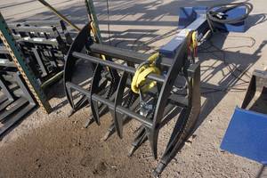 lot 21 image: Brand New Universal Mount Bobcat Skid Loader Skid Steer 48 Root Rake Grapple Attachment
