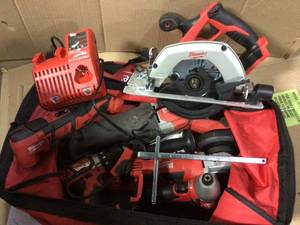 lot 30 image: M18 18-Volt Lithium-Ion Cordless Combo Tool Kit (6-Tool) with (2) 3.0 Ah Batteries, (1) Charger, (1) Tool Bag by Milwaukee GOOD CONDITION SEE PICS 