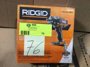 lot 76 image: 18-Volt OCTANE Cordless Brushless 12 in. Impact Wrench (Tool Only) with Belt Clip by RIDGID